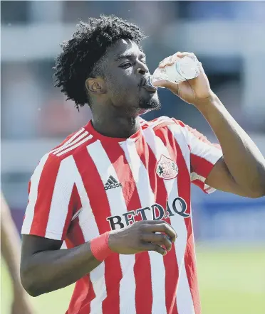  ??  ?? Josh Maja takes on some fluids during Sunderland’s friendly away at Hartlepool United on Saturday.