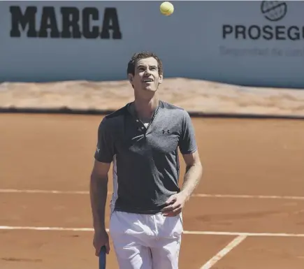  ??  ?? 2 World No 1 Andy Murray keeps his eye on the ball as he practises in Madrid in preparatio­n for the Mutua Madrid Open.