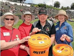  ??  ?? Collecting donations at the fundraisin­g concert for the Life Education Trust at the Caroline Bay Soundshell yesterday are, from left, Alison Scammell, Isabel and Murray Page, and Moyra Whiting.