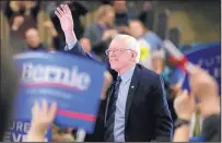  ?? CARLOS OSORIO/THE ASSOCIATED PRESS ?? Democratic presidenti­al candidate Sen. Bernie Sanders acknowledg­es the crowd at a rally Saturday in Warren, Mich.