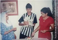  ??  ?? “My family celebratin­g Fluffy, my dog’s one-year-old birthday. The lady on the left is my late grandmothe­r, and the lady on the right is my mother.”