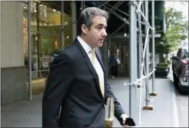  ?? RICHARD DREW — THE ASSOCIATED PRESS ?? Michael Cohen, former personal lawyer to President Donald Trump, leaves his apartment building, in New York, Tuesday.