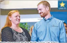  ??  ?? Ebola virus survivor Dr. Kent Brantly and his wife Amber attend a news conference at Emory University Hospital in Atlanta Thursday.
EPA