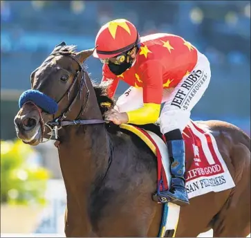  ?? Benoit Photo ?? LIFE IS GOOD, with jockey Mike Smith, is all alone as he comes down the stretch to win the San Felipe Stakes by eight lengths. Next up for the unbeaten colt will be the Santa Anita Derby on April 3.