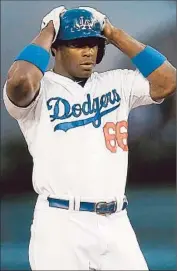  ?? Luis Sinco
Los Angeles Times ?? YASIEL PUIG APPEARS to be trying to change his image and connect with the community.