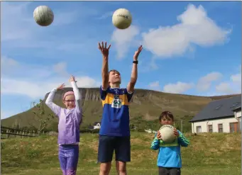  ??  ?? Thomas, James and Clare keeping active. Pic: Jimmy O’Brien.