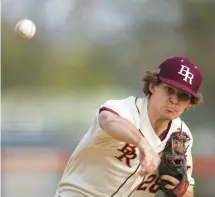  ?? ?? Brother Rice’s Cole Van Assen delivers a pitch against St. Laurence.