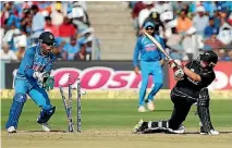  ?? AMIT DAVE ?? New Zealand’s Tom Latham is bowled for 38 in the second ODI in Pune.