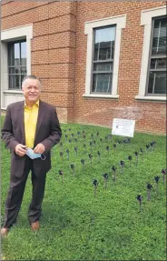  ?? SUBMITTED PHOTO ?? Len Iacono, a candidate for state representa­tive in the 156th House District, attended the ceremony. The pinwheels behind him represent each of the Chester County overdose victims in the past year.