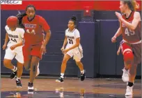  ?? Christian K. Lee ?? Liberty’s Dre’una Edwards, driving down the court in a game last season, tweeted that she will be playing her college ball for the University of Utah.
Las Vegas Review-journal