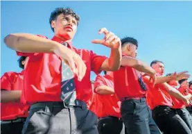  ?? ?? Above: Te Aute College students perform a haka at the Waitangi Day event.