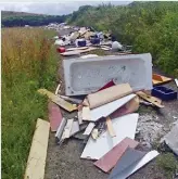  ??  ?? Impassable: Tons of rubbish strewn along a lane near Sunderland