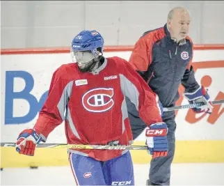  ?? J O H N MA H O N E Y ?? The Canadiens’ P. K. Subban and coach Michel Therrien skate past each other during practice at the training facility in Brossard Friday, two days after the coach made comments critical of the defenceman.