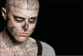  ?? FELIPE DANA — THE ASSOCIATED PRESS ?? In this Saturday file photo, Canadian model Rick Genest, aka Zombie Boy, appears on the runway during a fashion show in Rio de Janeiro, Brazil. On Friday the agency that represents Genest, known for his head-to-toe tattoos and his participat­ion in Lady...