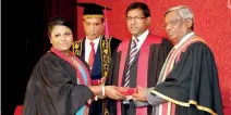  ??  ?? A student of the CA Sri Lanka School of Accounting and Business receiving her BSc. Degree in Applied Accounting at last year’s convocatio­n