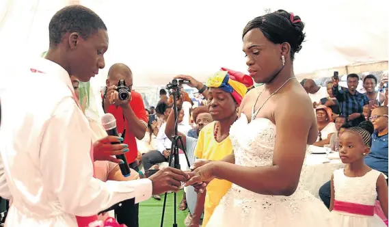  ?? / SANDILE NDLOVU ?? Nthabiseng Sello Rachoene and Given Vhuromo tie the knot in what was believed to be a first ever same sex marriage in Limpopo during a wedding held in Venda on November 14 2015.