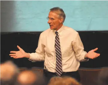  ??  ?? Dr. David Kohl delivers his presentati­on ‘Positionin­g For Success in the Economic Reset’ at the Mae Wilson Theatre.