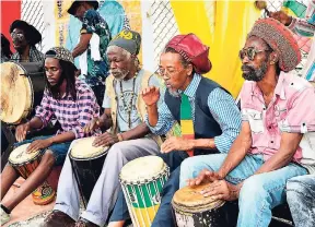  ??  ?? These drummers quickly occupied empty seats and kept the vibration going.