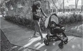  ?? D.A. VARELA dvarela@miamiheral­d.com ?? Daniel Andre, 62, walks with his granddaugh­ter, 8-month-old Gisselle, at Victory Park in North Miami Beach. The city has the cheapest median rent in Miami-Dade County.