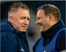  ??  ?? Delight: Kilmacud Crokes joint managers Johnny Magee (left) and Robbie Brennan guided the club to the Dublin Senior Championsh­ip (main)