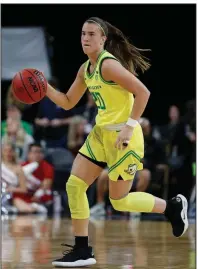  ??  ?? Oregon’s Sabrina Ionescu (20) was a unanimous selection as The Associated Press women’s player of the year on Monday. Ionescu became the first player in NCAA history to have at least 2,000 points, 1,000 rebounds and 1,000 assists for a career. (AP/John Locher)