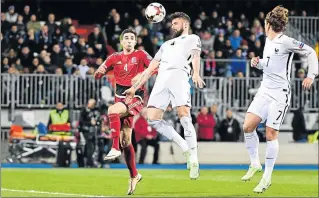  ?? Picture: AFP ?? FRENCH CONNECTION: France’s forward Olivier Giroud, middle, scores the third goal during the World Cup-qualifying match between Luxembourg and France on Saturday at the Josy Bartel Stadium in Luxembourg