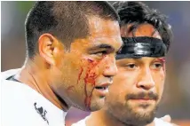  ?? Photo / Photosport ?? Adam Blair (left) and star debutant Patrick Herbert share a moment after the Warriors’ narrow loss to the Storm.