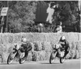  ??  ?? Canellas (4) leads Angel Nieto on a Derbi in 1970