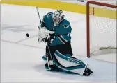  ?? NHAT V. MEYER — BAY AREA NEWS GROUP ?? San Jose Sharks goaltender Martin Jones blocks a shot against the Colorado Avalanche during a game in March.