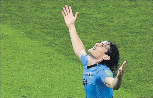  ?? [ AFP ] ?? Edinson Cavani: Uruguays Stürmersta­r zelebriert seinen Doppelpack.