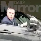  ??  ?? Disgusting: After an angry exchange, Carragher spits out of his car window at the Manchester United fan DAILY MIRROR