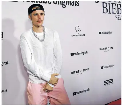  ?? REUTERS/MARIO ANZUONI ?? Singer Justin Bieber poses at the premiere for the documentar­y television series Justin Bieber: Seasons in Los Angeles on Jan. 27, 2020.