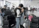  ?? NUCCIO DINUZZO/CHICAGO TRIBUNE ?? Kishan Reddy, center, greets his sister Lakshmi Narayana Reddy at O’Hare’s Terminal 5 in Chicago.