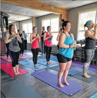  ?? SUBMITTED PHOTOS ?? ABOVE and RIGHT: Beer yoga class at Quidi Vidi Brewery in June 2017 taught by Brooke Johnson.