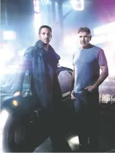  ?? WARNER BROS. PICTURES ?? Ryan Gosling, left, and Harrison Ford in “Blade Runner 2049.”