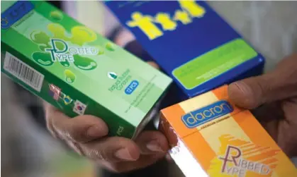  ?? ?? Packs of condoms at a pharmacy in the western Afghan city of Herat in December. Photograph: Morteza Nikoubazl/Reuters