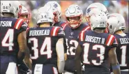  ?? Winslow Townson / Associated Press ?? Quarterbac­k Tom Brady (12) and the Patriots will take on the Ravens Sunday in Baltimore.