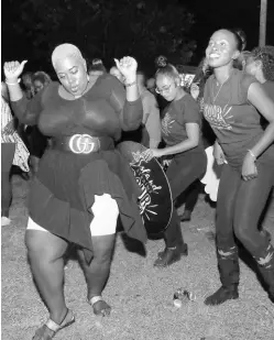  ?? PHOTO BY ASHLEY ANGUIN ?? Patrons enjoying themselves at the recent Reggae Sumfest street dance in Montego Bay, St James.