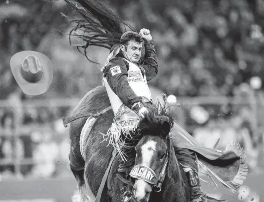  ?? Jon Shapley / Staff photograph­er ?? Kaycee Feild, who endured a fractured skull among other injuries this past year, is vying for his sixth bareback title in nine years at Rodeo Houston.