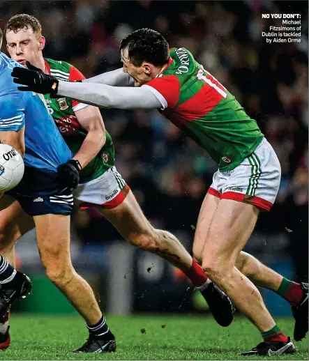  ?? ?? NO YOU DON’T: Michael Fitzsimons of Dublin is tackled by Aiden Orme