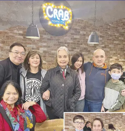  ?? ?? Matey Alberto, famed Hollywood and Las Vegas couturier David Tupaz, the author, owners Krista Ranillo and Nino Lim with their son