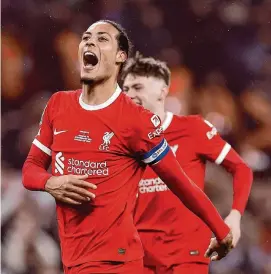  ?? Julian Finney/Getty Images ?? Liverpool’s Virgil van Dijk celebrates after his team’s victory over Chelsea on Sunday.