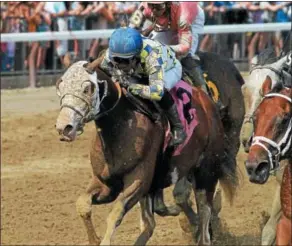  ?? PHOTO SPENCER TULIS ?? Southern Phantom (center) competing in his maiden special weight race Saturday afternoon for two-year-olds at Saratoga Race Course. A fifth-place finish shouldn’t deter his newly found fan base.