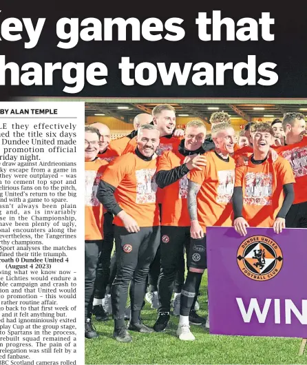  ?? ?? CHAMPIONS: Dundee United players and officials celebrate after the club