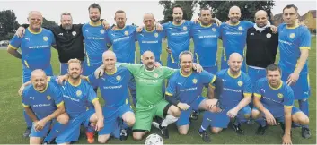  ??  ?? The PNE team wearing Ian Fovargue tribute shirts before the game