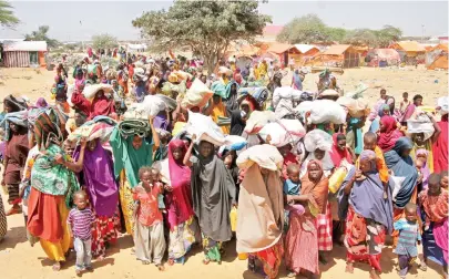  ??  ?? Somalis displaced by a drought arrive at makeshift camps on the outskirts of Mogadishu in this March 30 file photo. (AP)