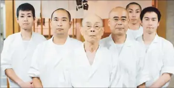  ?? Magnolia Pictures ?? THE MASTER and his assistants gather in “Jiro Dreams of Sushi,” a film about Tokyo sushi chef Jiro Ono.