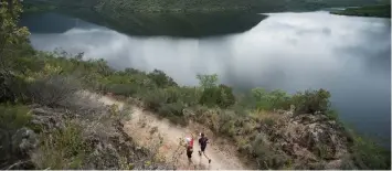  ??  ?? RUNNERS taking part in the Rhodes Quality Dryland Traverse will pass an undergroun­d route through the world-famous Cango Caves. Stages ahead include summiting the Swartberg Mountains, breathtaki­ng views of the Great and Klein Karoo, and trails that run past the renowned Raubenheim­er Dam.