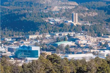  ?? EDDIE MOORE/JOURNAL ?? Los Alamos National Laboratory’s average annual economic impact over a recent three-year period was $3.1 billion, according to a UNM study.