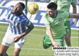  ??  ?? SPOOKED Kabamba tussles with Hoops full-back Greg Taylor